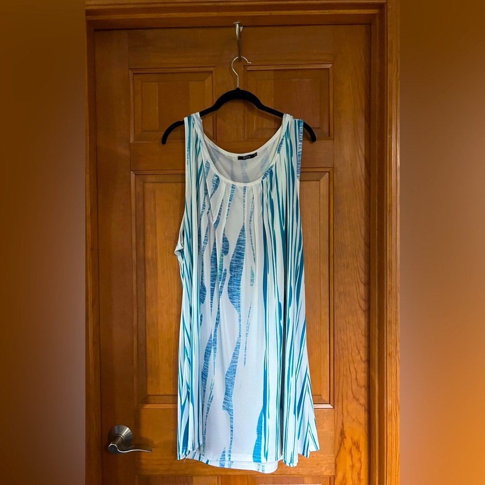 Lily swing, tunic, tank. 4x